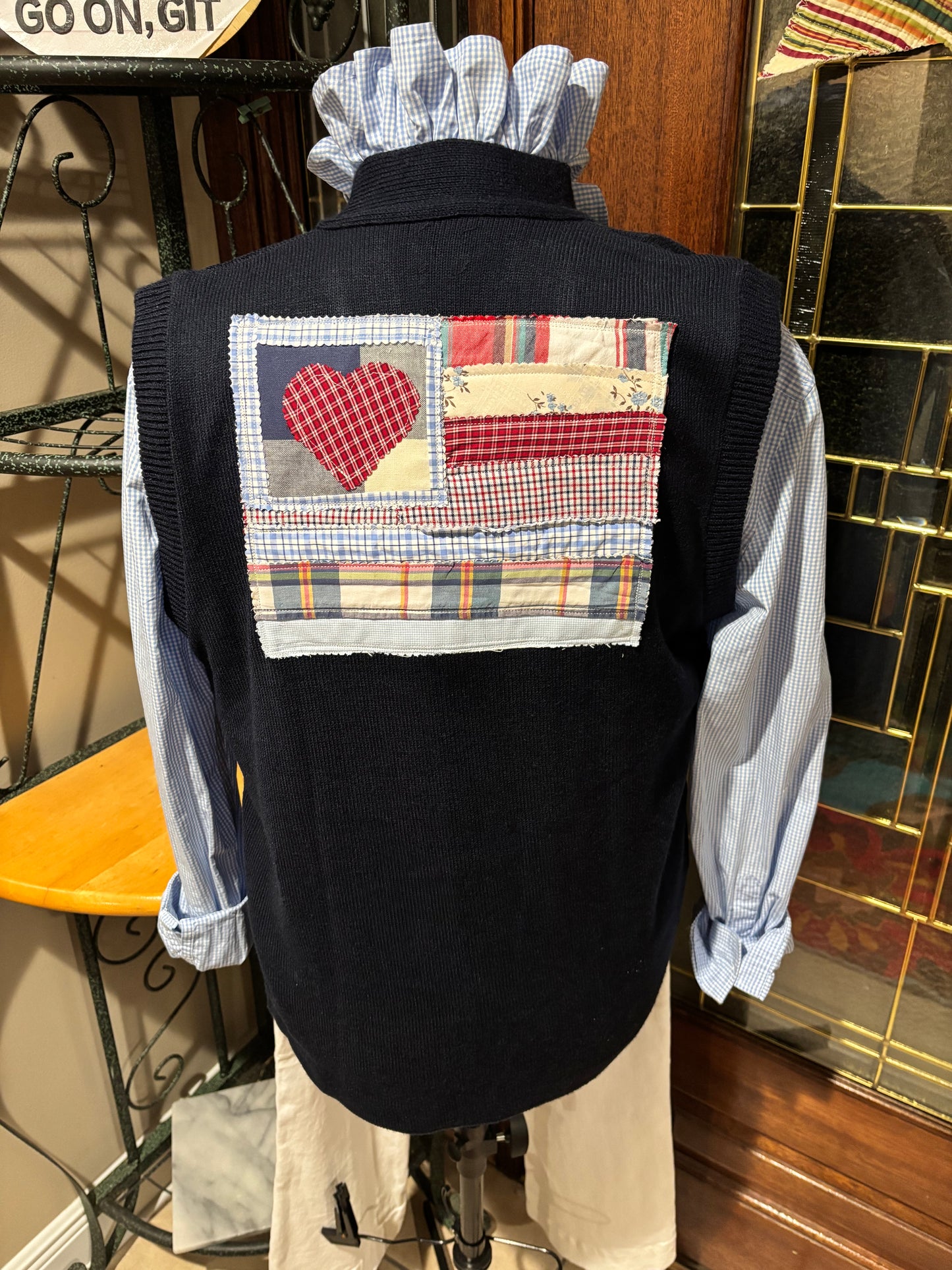 Retired USPS knit vest with patriotic theme and hand quilted flag applique on back.