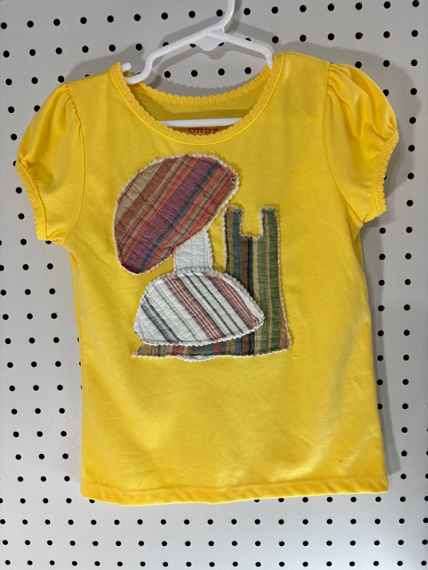 Quilted snail appliqué girls top