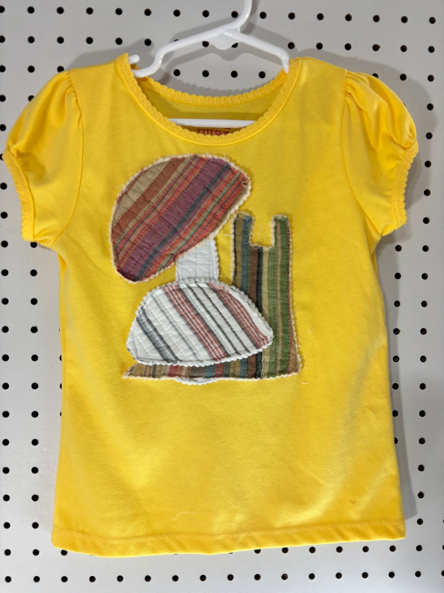 Quilted snail appliqué girls top