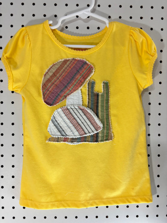Quilted snail appliqué girls top