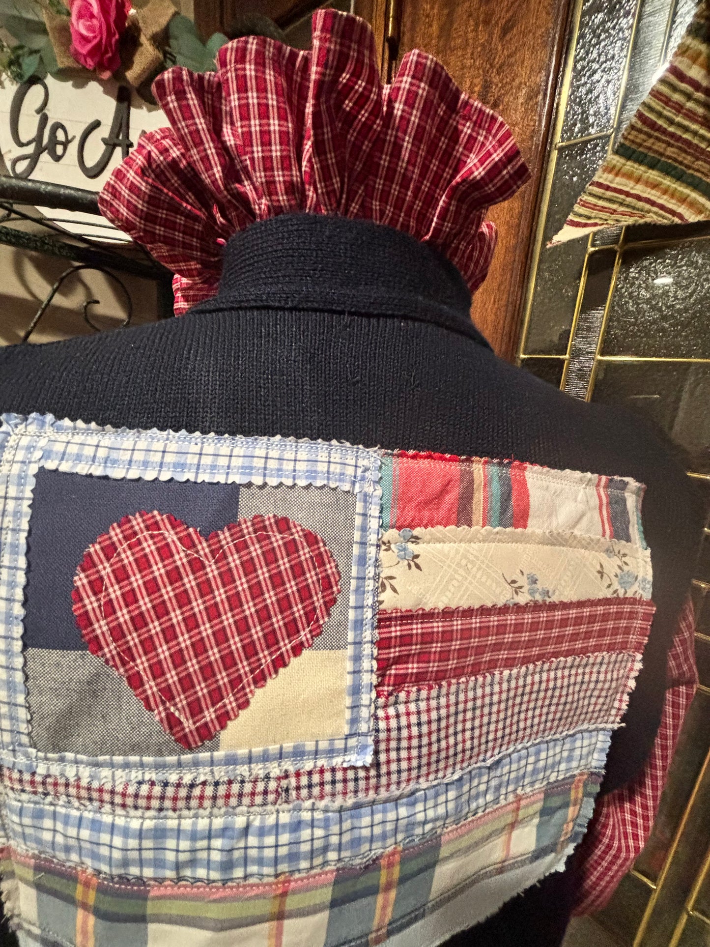 Retired USPS knit vest with patriotic theme and hand quilted flag applique on back.