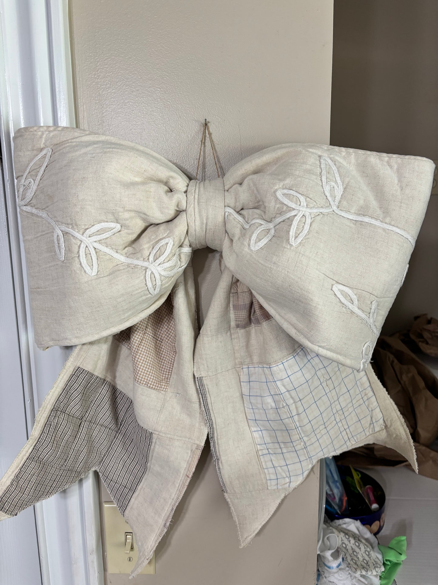 Quilted bow hanger cord and patch