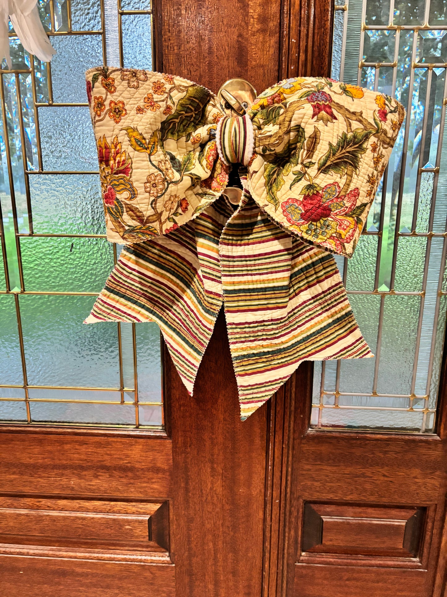 Quilted mustard bow hanger