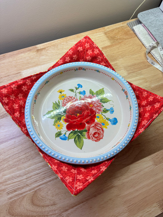 Reversible hot plate pie holder
