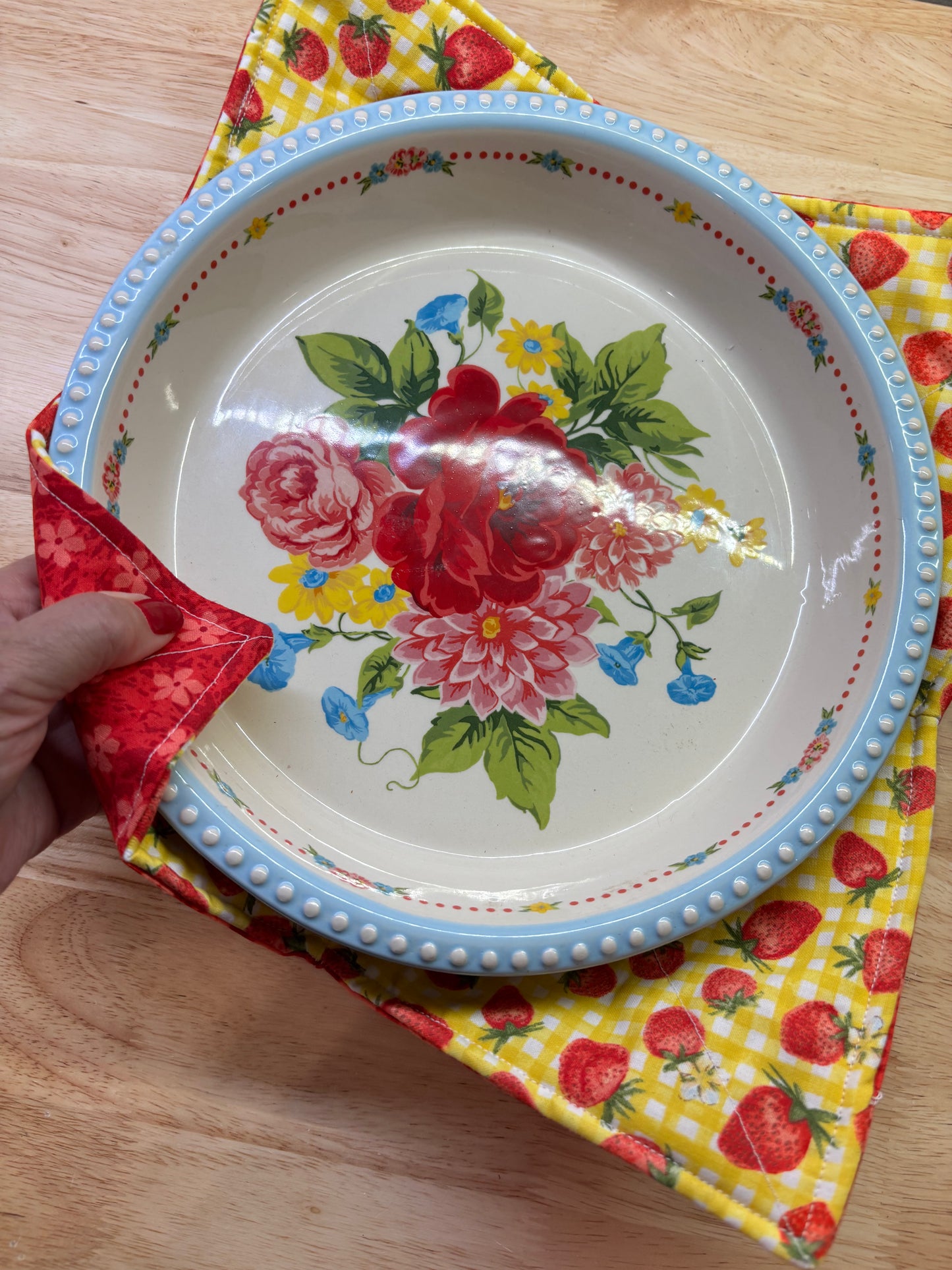 Reversible hot plate pie holder